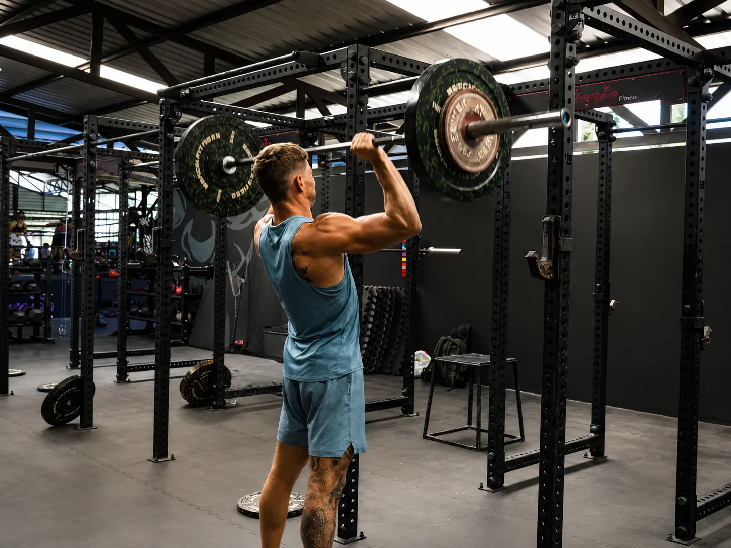 Fighter strength training with overhead press